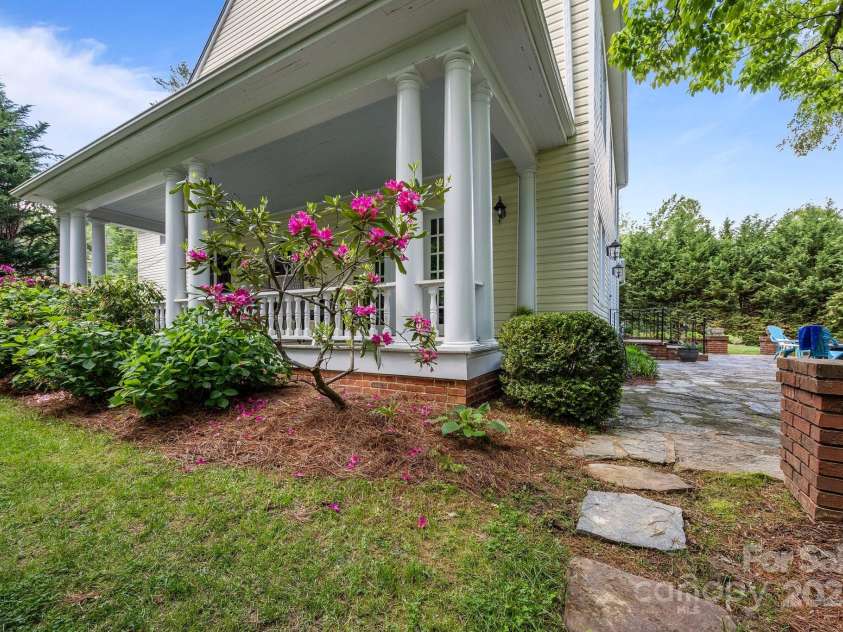 100 Poplar Spring Trail, Hendersonville, NC 28739.  MLS# CAR4251710, YatesRealty ID 28067. South Covered Porch