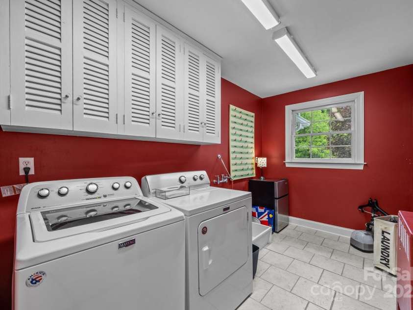 100 Poplar Spring Trail, Hendersonville, NC 28739.  MLS# CAR4251710, YatesRealty ID 28067. Upper level Laundry
