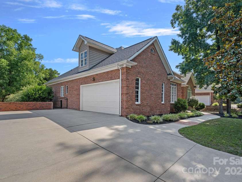 343 Gringley Hill Road, Fort Mill, SC 29708.  MLS# CAR4274138, YatesRealty ID 28068. Driveway/Garage