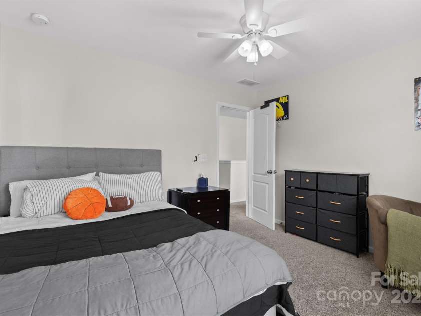 2042 Newport Drive, Fort Mill, SC 29707.  MLS# CAR4257730, YatesRealty ID 28069. Bed #1 with WIC