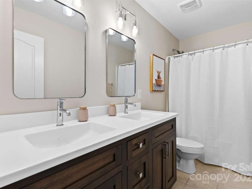 2042 Newport Drive, Fort Mill, SC 29707.  MLS# CAR4257730, YatesRealty ID 28069. Full bathroom upstairs
