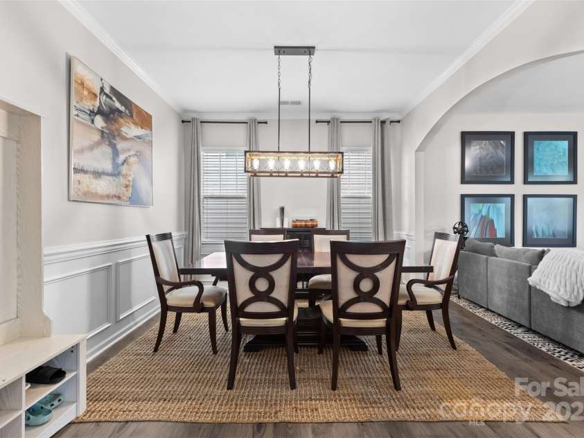 2042 Newport Drive, Fort Mill, SC 29707.  MLS# CAR4257730, YatesRealty ID 28069. Open floorplan dining room with archways to living room