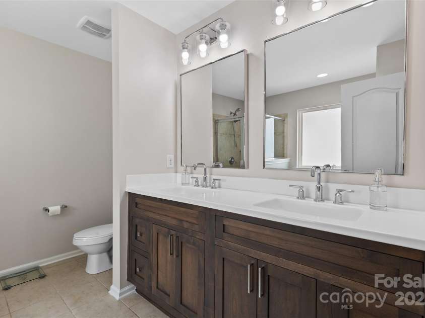 2042 Newport Drive, Fort Mill, SC 29707.  MLS# CAR4257730, YatesRealty ID 28069. Primary bathroom