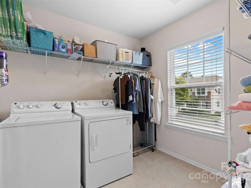 2042 Newport Drive, Indian Land, SC 29707.  MLS# CAR4257730, YatesRealty ID 28069. Laundry room with storage
