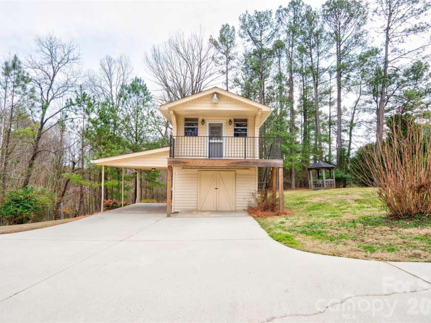 845 Long Branch Road, Grover, NC 28073.  MLS# CAR4353452, YatesRealty ID 2807. 2 Story Building/ Workshop with single Carport