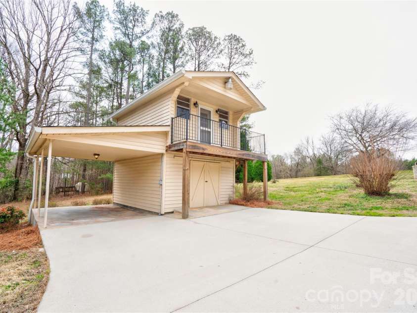 845 Long Branch Road, Grover, NC 28073.  MLS# CAR4353452, YatesRealty ID 2807. 2 Story Building/ Workshop with Single Carport