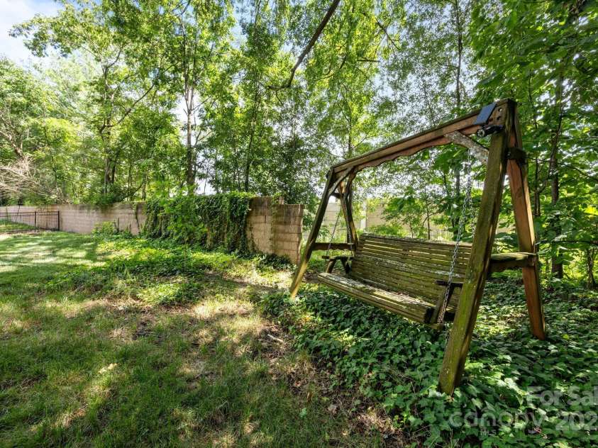 6932 Curlee Court, Charlotte, NC 28277.  MLS# CAR4283210, YatesRealty ID 28075. Swing in the backyard