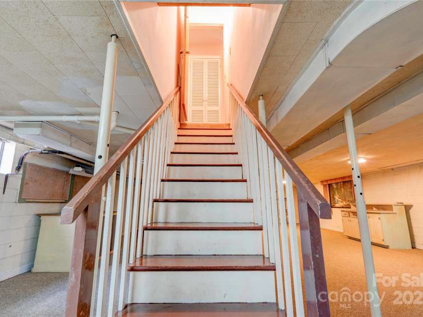 1400 Post Road, Shelby, NC 28150.  MLS# CAR4283138, YatesRealty ID 28078. Stairs from Basement to Main Level
