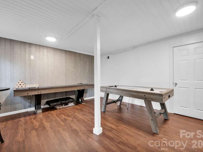 470 Lakeview Shores Loop, Mooresville, NC 28117.  MLS# CAR4366242, YatesRealty ID 28079. Lower Level Game Room