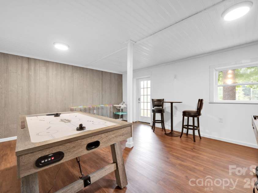 470 Lakeview Shores Loop, Mooresville, NC 28117.  MLS# CAR4366242, YatesRealty ID 28079. Lower Level Game Room
