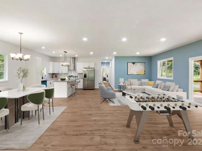 88 Arbor View Drive, Marion, NC 28752.  MLS# CAR4284677, YatesRealty ID 28079. Virtually Staged Livingroom / dining