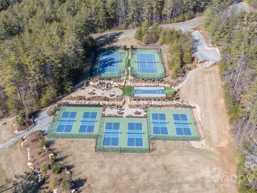 92 Rusty Hook Road, Nebo, NC 28761.  MLS# CAR4285158, YatesRealty ID 28080. Tennis and pickleball courts at the camp