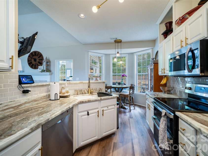 136 Cottage Ridge Road, Fletcher, NC 28732.  MLS# CAR4385650, YatesRealty ID 28081. Kitchen new granite