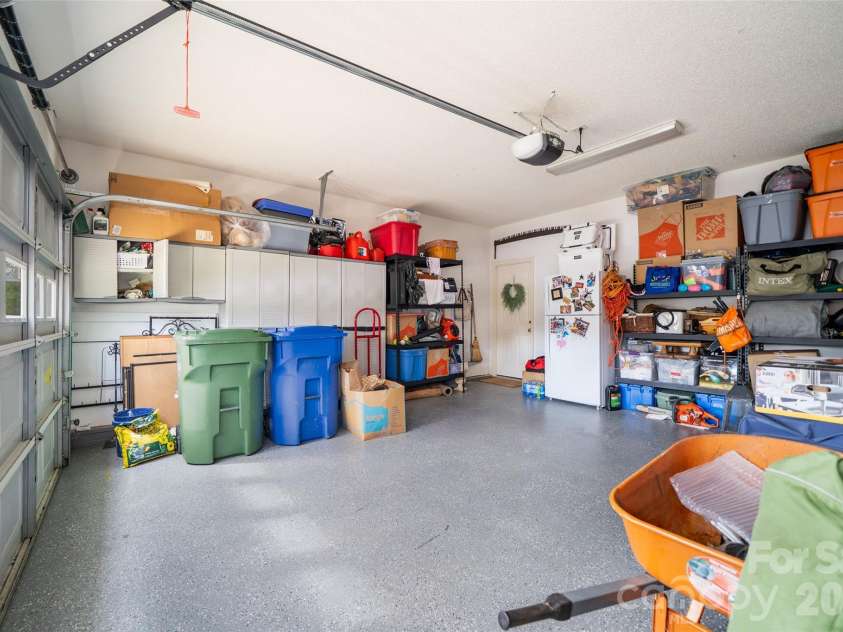 136 Cottage Ridge Road, Fletcher, NC 28732.  MLS# CAR4385650, YatesRealty ID 28081. Large garage