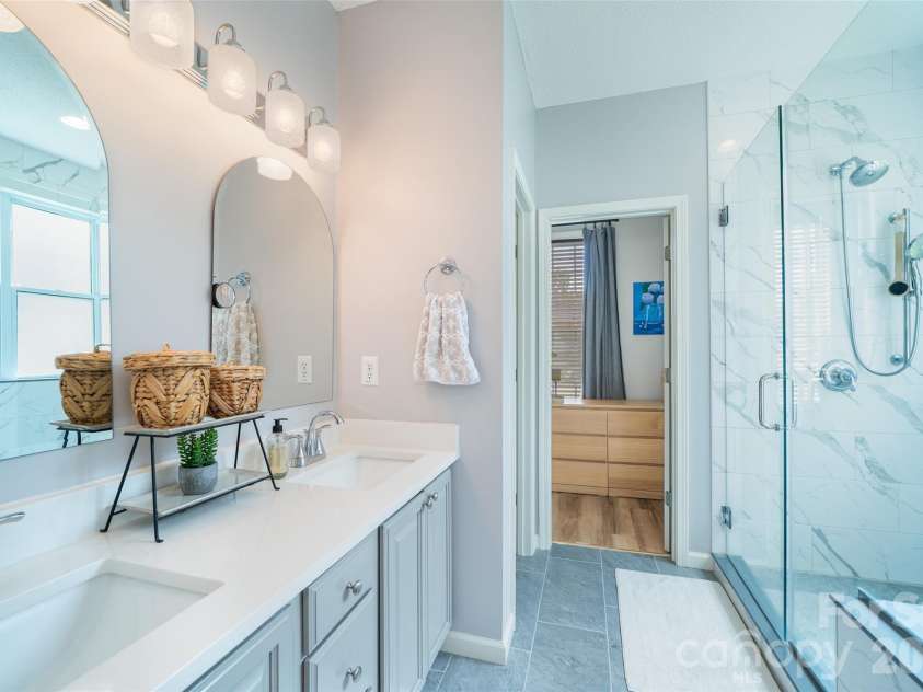 136 Cottage Ridge Road, Fletcher, NC 28732.  MLS# CAR4385650, YatesRealty ID 28081. Primary bathroom featuring tile shower