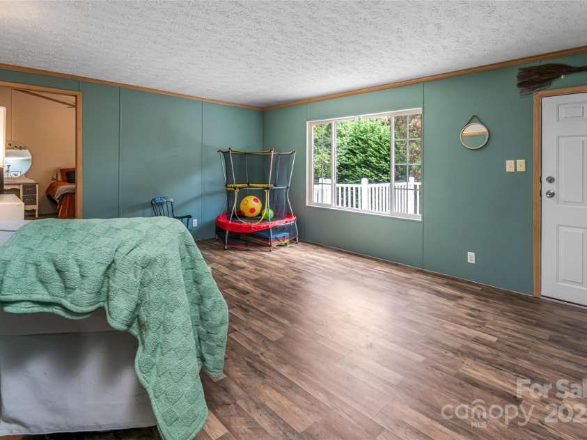 118 Reeves Road, Leicester, NC 28748.  MLS# CAR4280942, YatesRealty ID 28083. 