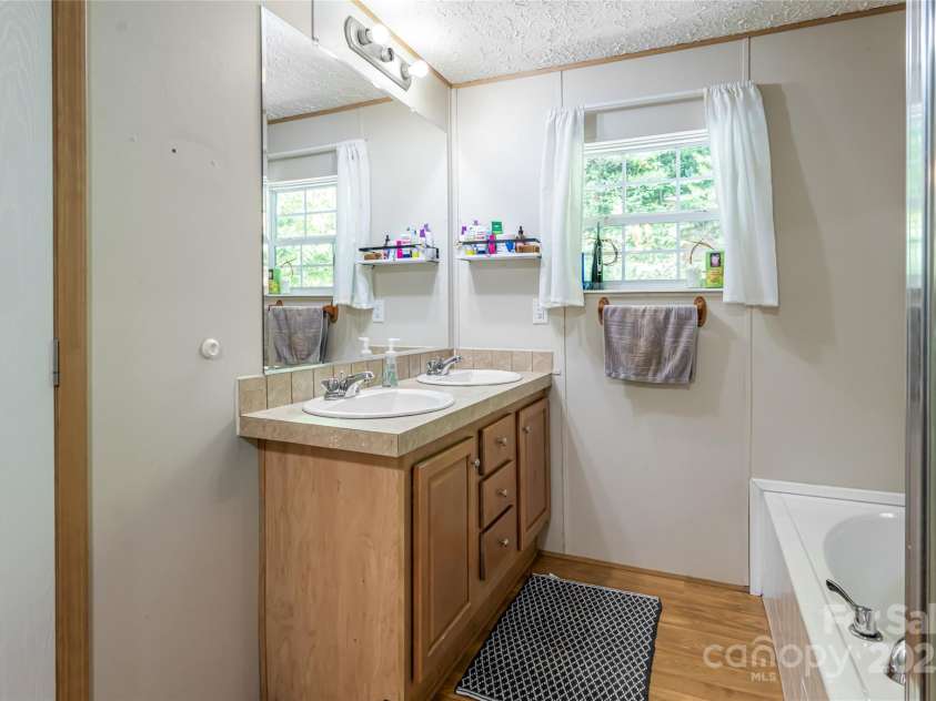 118 Reeves Road, Leicester, NC 28748.  MLS# CAR4280942, YatesRealty ID 28083. 