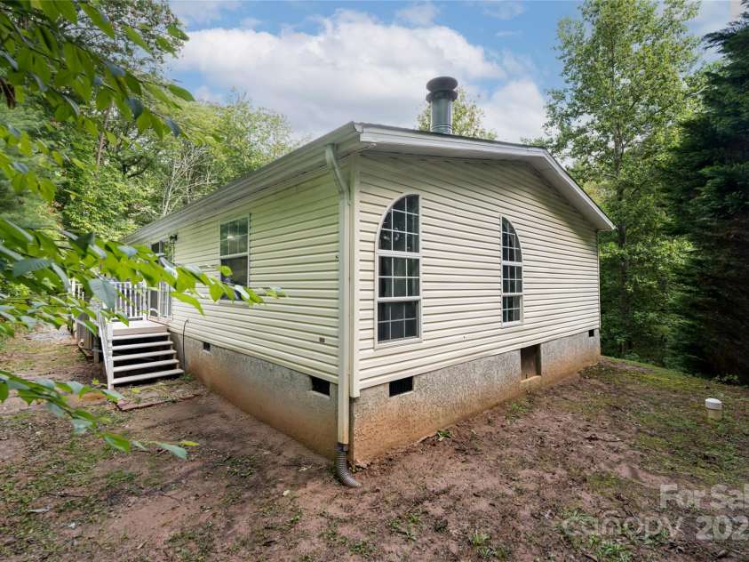 118 Reeves Road, Leicester, NC 28748.  MLS# CAR4280942, YatesRealty ID 28083. 