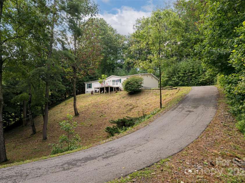 118 Reeves Road, Leicester, NC 28748.  MLS# CAR4280942, YatesRealty ID 28083. 