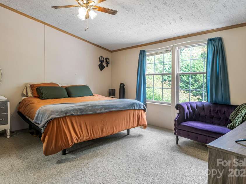 118 Reeves Road, Leicester, NC 28748.  MLS# CAR4280942, YatesRealty ID 28083. Large Primary Suite