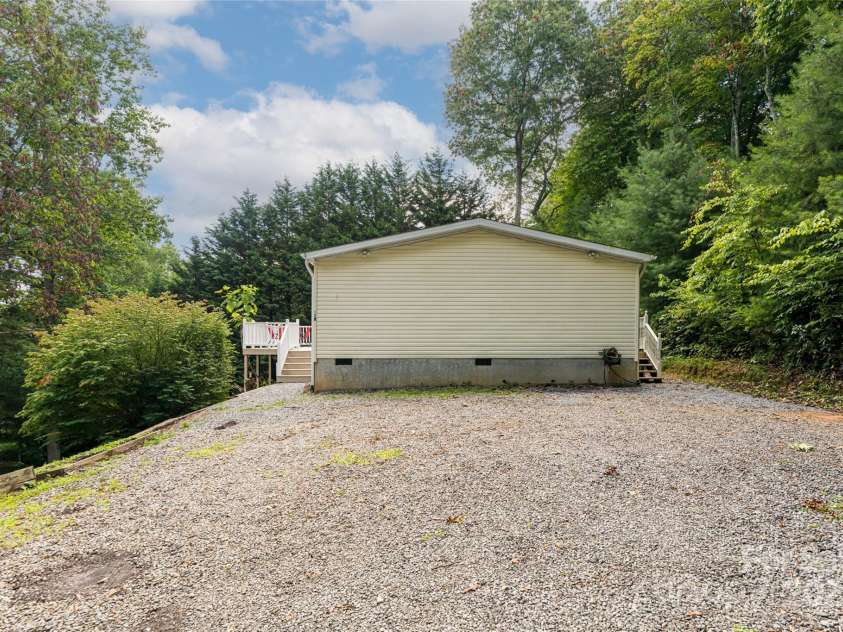 118 Reeves Road, Leicester, NC 28748.  MLS# CAR4280942, YatesRealty ID 28083. Lots of parking