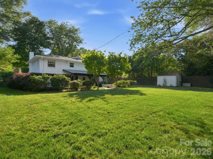 733 Stanfield Drive, Charlotte, NC 28210.  MLS# CAR4386854, YatesRealty ID 28084. Huge Flat Backyard and Patio