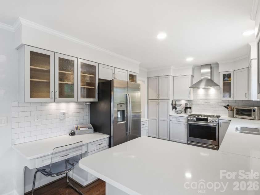 733 Stanfield Drive, Charlotte, NC 28210.  MLS# CAR4386854, YatesRealty ID 28084. Open Kitchen with Counter Seating and Desk