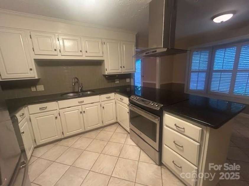 252 Deerfield Street, Lenoir, NC 28645.  MLS# CAR4285316, YatesRealty ID 28086. Lovely kitchen area