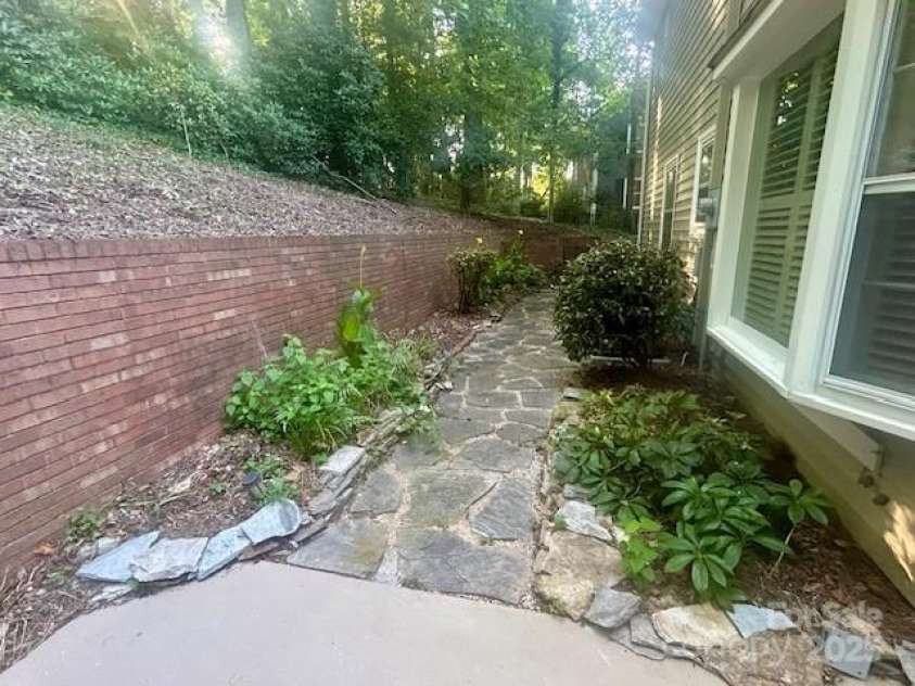 252 Deerfield Street, Lenoir, NC 28645.  MLS# CAR4285316, YatesRealty ID 28086. Patio area in the rear of the home