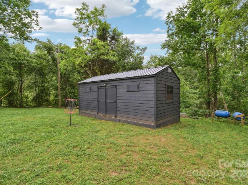 906 Merrills Cove Road, Asheville, NC 28803.  MLS# CAR4264221, YatesRealty ID 28089. Approx. 289sf shed