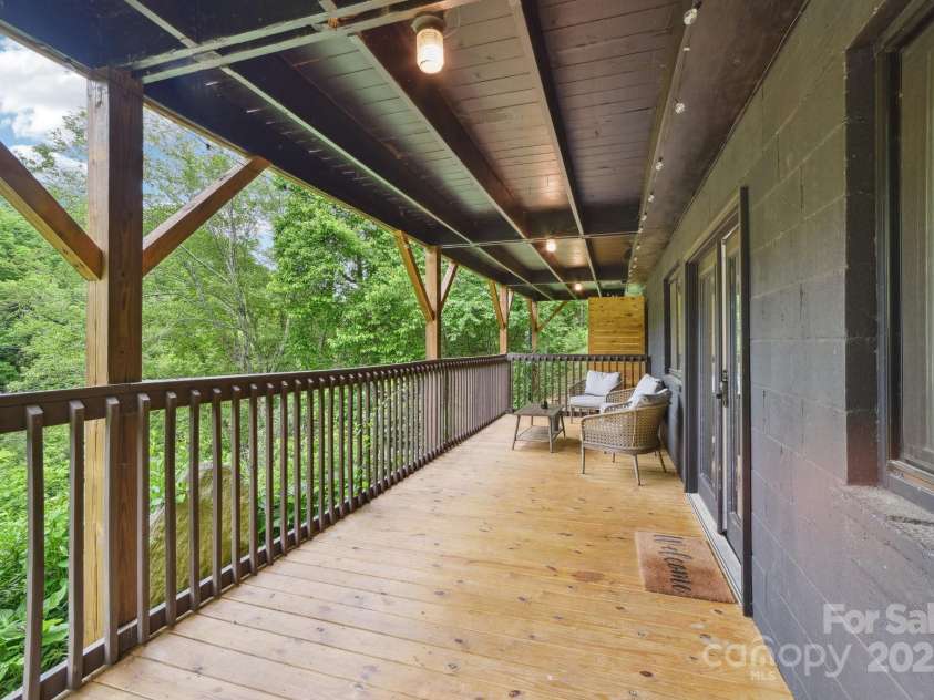 906 Merrills Cove Road, Asheville, NC 28803.  MLS# CAR4264221, YatesRealty ID 28089. Deck view