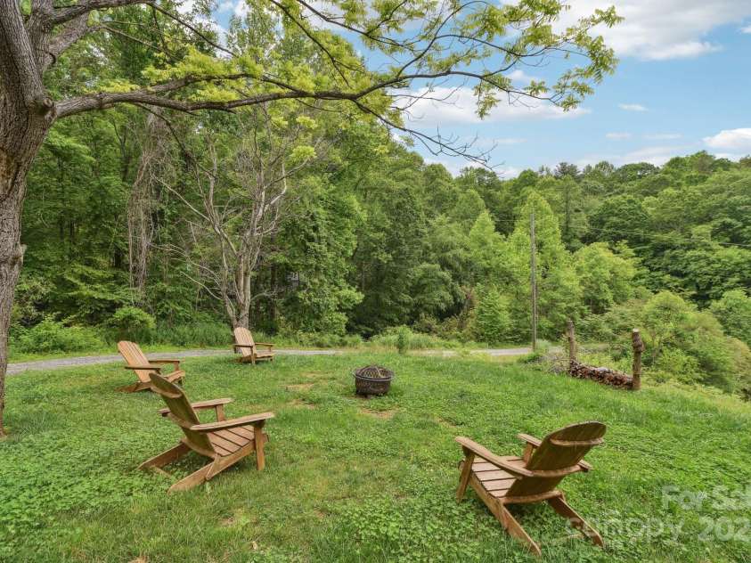 906 Merrills Cove Road, Asheville, NC 28803.  MLS# CAR4264221, YatesRealty ID 28089. Great entertaining space!