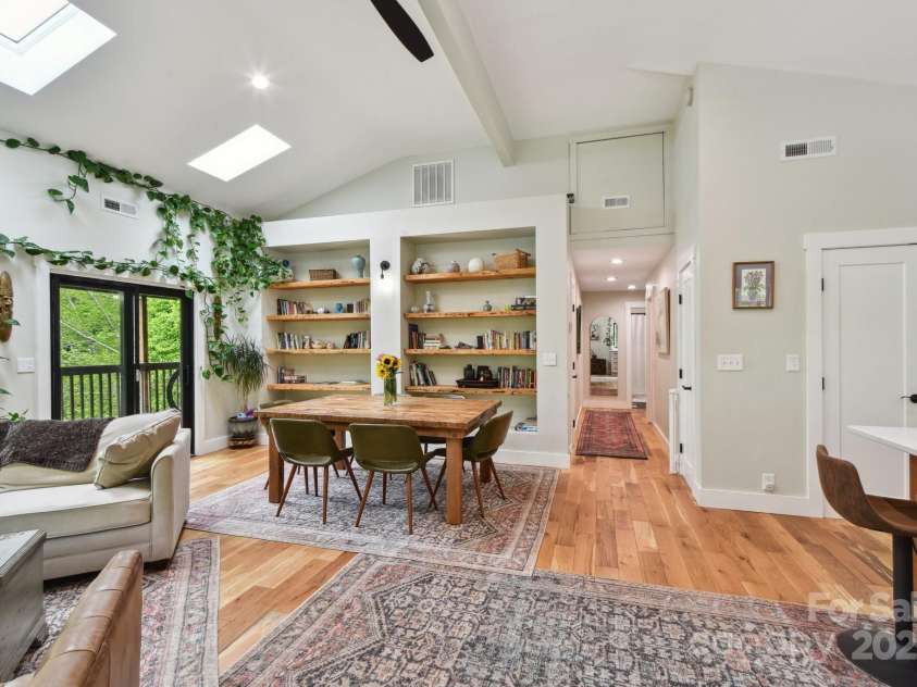 906 Merrills Cove Road, Asheville, NC 28803.  MLS# CAR4264221, YatesRealty ID 28089. Looking down hallway towards bedrooms