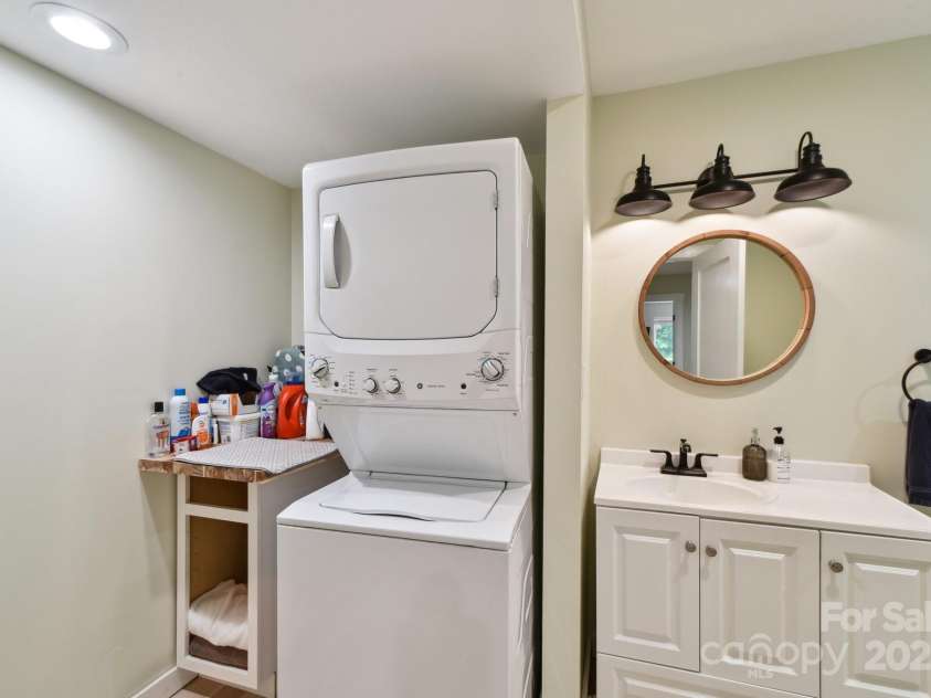 906 Merrills Cove Road, Asheville, NC 28803.  MLS# CAR4264221, YatesRealty ID 28089. Lower level washer/dryer