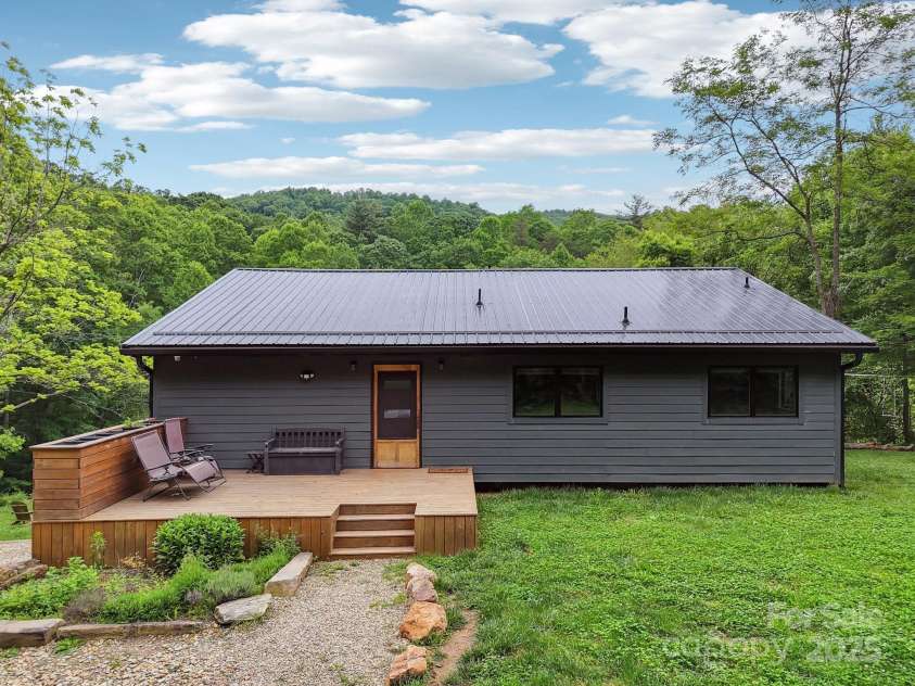 906 Merrills Cove Road, Asheville, NC 28803.  MLS# CAR4264221, YatesRealty ID 28089. Nice front deck for relaxing!