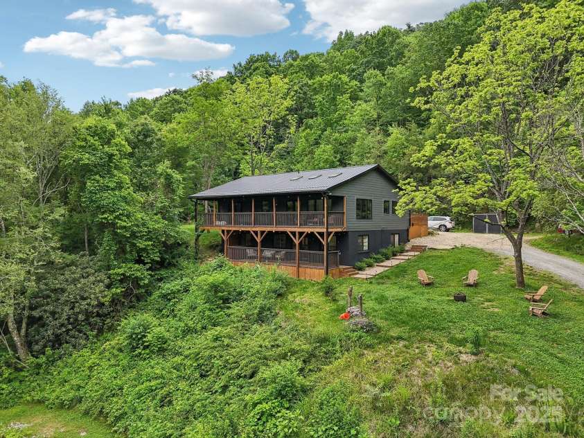 906 Merrills Cove Road, Asheville, NC 28803.  MLS# CAR4264221, YatesRealty ID 28089. Your private mountain escape awaits!