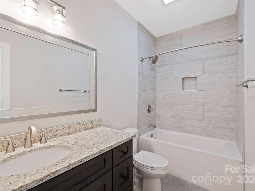 73 Wisdom Cove Road, Flat Rock, NC 28731.  MLS# CAR4203764, YatesRealty ID 28093. Full bathroom downstairs 