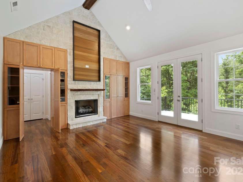 73 Wisdom Cove Road, Flat Rock, NC 28731.  MLS# CAR4203764, YatesRealty ID 28093. Gas fireplace in living room