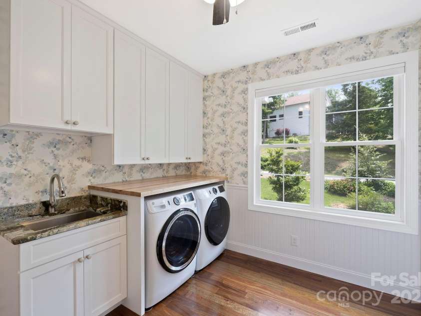73 Wisdom Cove Road, Flat Rock, NC 28731.  MLS# CAR4203764, YatesRealty ID 28093. Laundry room
