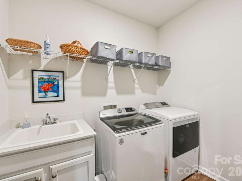 1328 Dali Boulevard, Mount Holly, NC 28120.  MLS# CAR4376476, YatesRealty ID 28096. Super convenient laundry with utility sink!