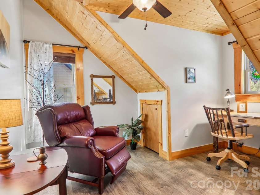 589 Panoramic Loop, Maggie Valley, NC 28751.  MLS# CAR4372216, YatesRealty ID 28097. Loft has mountain views and room for office or media area