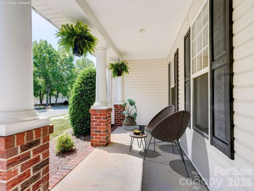 2025 Gable Way Lane, Matthews, NC 28104.  MLS# CAR4377619, YatesRealty ID 28100. Virtually Staged Front Porch
