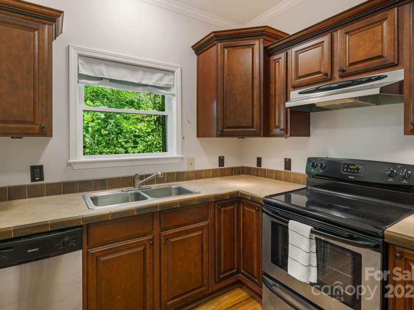 28 Back Stage Pass, Canton, NC 28716.  MLS# CAR4284833, YatesRealty ID 28100. Kitchenette for convenience or in-law suite