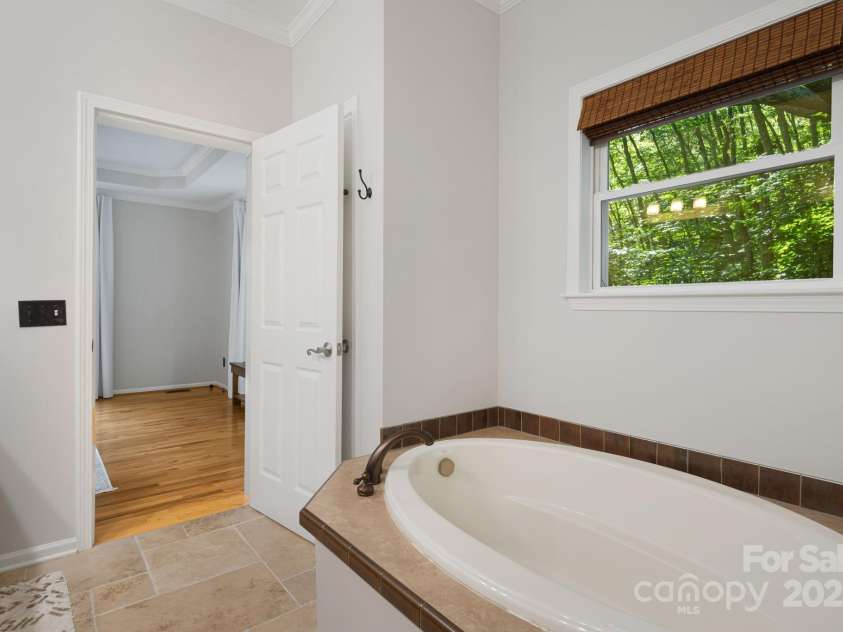 28 Back Stage Pass, Canton, NC 28716.  MLS# CAR4284833, YatesRealty ID 28100. Lg. bath with tile flooring, garden tub & separate shower.