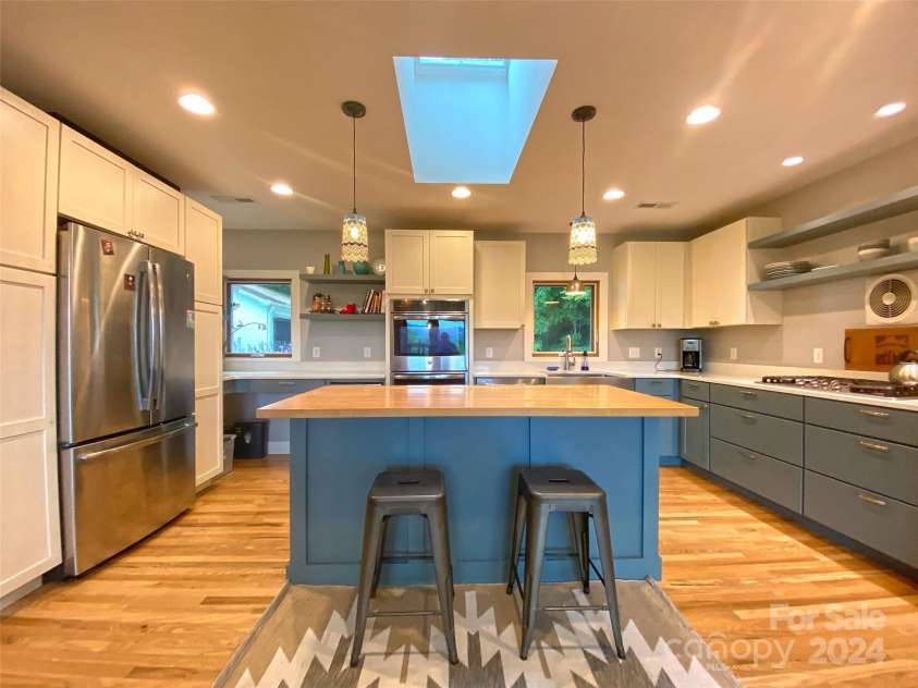 273 & 133 Nicholson Lane, Etowah, NC 28729.  MLS# CAR4133823, YatesRealty ID 28102. Kitchen at 273