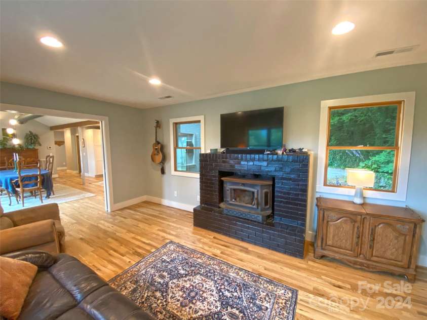273 & 133 Nicholson Lane, Etowah, NC 28729.  MLS# CAR4133823, YatesRealty ID 28102. Living Room at 273