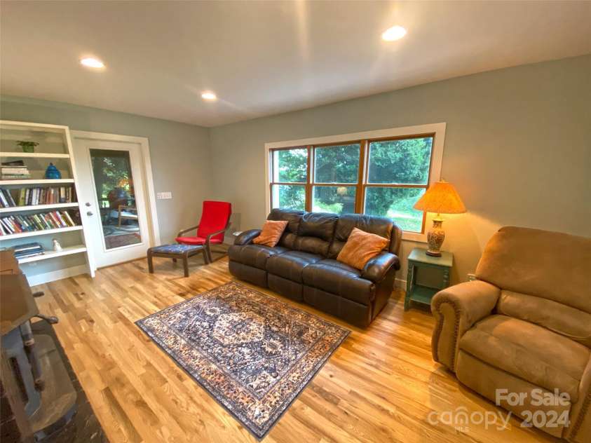273 & 133 Nicholson Lane, Etowah, NC 28729.  MLS# CAR4133823, YatesRealty ID 28102. Living Room at 273