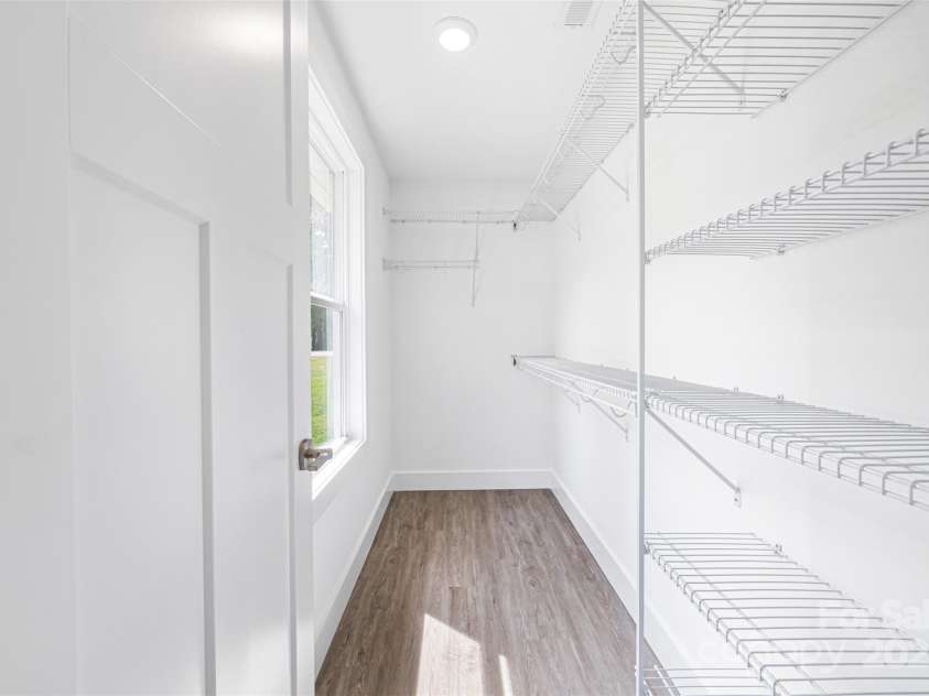 2027 Marquesas Avenue, Tega Cay, SC 29708.  MLS# CAR4262769, YatesRealty ID 28103. Bedroom 2 closet