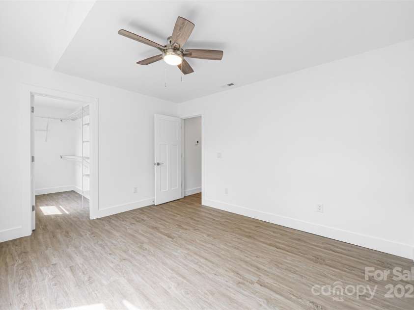 2027 Marquesas Avenue, Tega Cay, SC 29708.  MLS# CAR4262769, YatesRealty ID 28103. Bedroom 2 with walk in closet