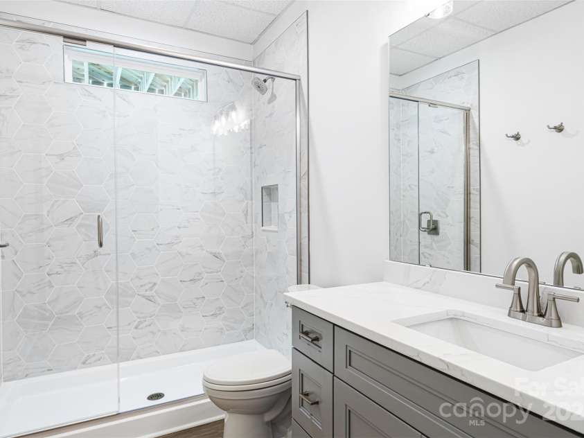 2027 Marquesas Avenue, Tega Cay, SC 29708.  MLS# CAR4262769, YatesRealty ID 28103. Full Bath Lower level